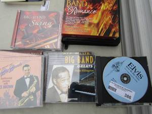 lot 386 image: Assorted Elvis and big band CDs x 12 Black CD case