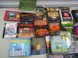 lot 389 image: Various audible books Robin  Cook, Lee Child, Stephen Coonts, Brad Thor