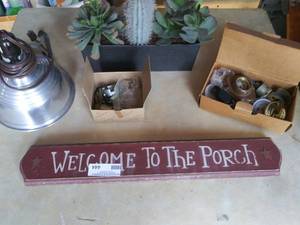 lot 254 image: Faux cactus plant, welcome to the porch sign, heat lamp and doorknob parts (444)