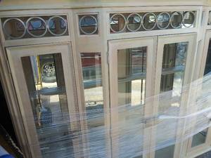 lot 12 image: Stanley China Hutch  2 piece   TOP -double doors 3 tier glass shelving   BASE has 3 doors 3 drawers