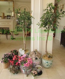lot 19 image: Assorted artificial plants, trees and flowers in decorative pots (one pot with tree is broken)
