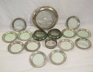 lot 29 image: Sterling silver and crystal antique Frank M. Whiting Co. coaster sets and larger wine bottle coaster