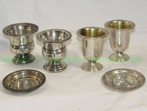 lot 30 image: Sterling silver vintage toothpick holderscondiment cups and base saucers