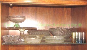 lot 32 image: Assorted glass serving ware as shown Includes vintage diamond point glass and pedestal twist glass comppte