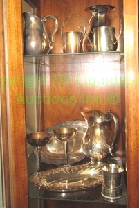 lot 37 image: Assorted silver plate serving ware as shown. Includes chased water pitcher and watering pot