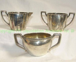 lot 67 image: Sterling English late Victorian silver sugar and creamer servers