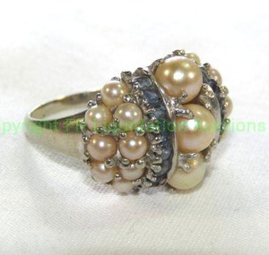 lot 426 image: 14K Pearl and Sapphire Ring with prong set pearls and channel set blue sapphires. Sapphires tested. Marked 14K Size 6.5