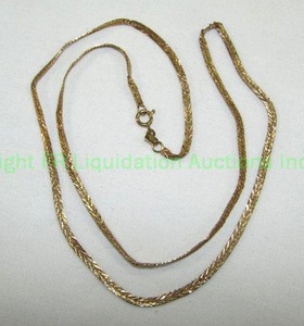 lot 427 image: 14K Italian Chain. Kinked and Twisted. Clasp marked 14K Italy OR Approx 20L