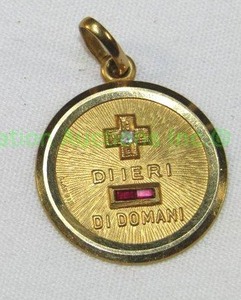 lot 437 image: 18K Religious Medallion, marked .750 with a diamond.
