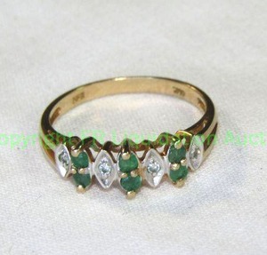 lot 442 image: 10K Diamond and Emerald Ring. Diamonds and Emeralds tested. Size 7.25 Marked 10K ESX