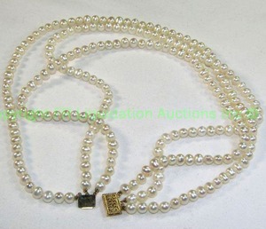 lot 446 image: 14K Gold and 3 strand pearl Necklace. Shortest strand 16 Longest 18 Marked 14k IWI on insertion clasp.