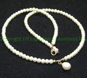 lot 447 image: 14K Pearl Necklace with attached pearl pendant, Marked 14K 15L