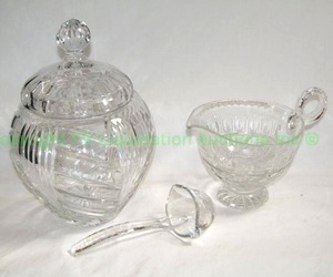 lot 91 image: Lead crystal lidded ginger or jam jar and gravy cup with ladle