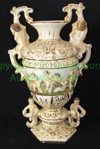 lot 104 image: Vintage Capodimonte made Italy (marked) trophy vase, repair, 19 tall