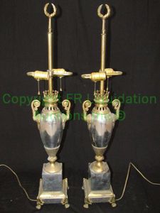 lot 101 image: Vintage trophy lamp set with brass embellishments and polished black metal body, 35 tall