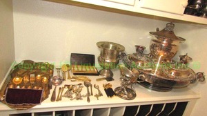 lot 112 image: Assorted silver plate serving ware including large carousel server as shown