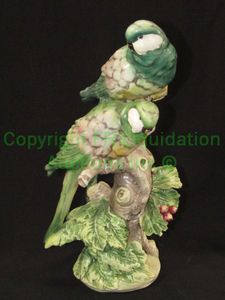 lot 141 image: Antique Capodimonte made in Italy ceramic parrots, Marked, 10 tall