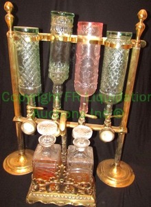 lot 129 image: Antique Optic pearl opal deluxe liquor dispenser and crystal liquor decanters with brass fitted bottle holder, 26 tall