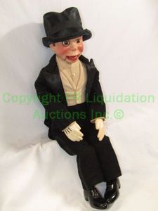 lot 170 image: Charlie McCarthy ventriloquist doll with monocle by Effanbee (a trade name of Fleischaker & Baum, doll-makers in New York)