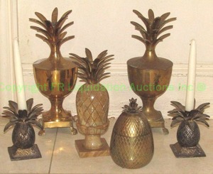 lot 153 image: Brass, glass and soap stone pineapples, tallest is 13
