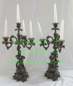 lot 634 image: Pair of antique bronze cherub figural base 3 arm candelabras, Marked 501 DG, 18.5 tall each