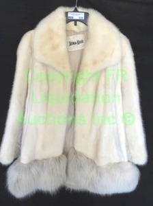 lot 539 image: Neiman Marcus white mink fur and tailored wool jacket w after market trim at hem. Soft hand