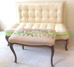 lot 698 image: Vintage upholstered double cushion button tufted settee with crewel needlepoint topped ottoman, cabriole legs