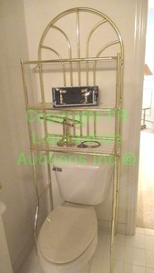 lot 703 image: Brass bath arched etagere storage rack and brass accessories as shown