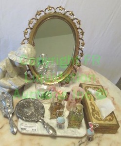 lot 713 image: Assorted decor. Includes Charcuterie marble, silver plate mirror and brush set, Florentine Italian Tissue box cover plus