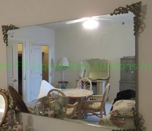 lot 719 image: Self framed large mirror with scrollwork corner embellishments as shown, 52 x 35