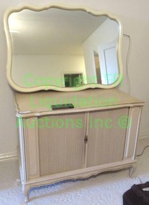 lot 721 image: Vintage mid century tambour storage cabinet (42 x 23 x 30) with French Provincial scalloped framed mirror (46 x 31) and Curtis Mathes TV w remote