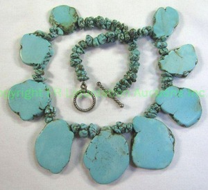 lot 550 image: Sterling Silver (unmarked) chunky bead and slab turquoise necklace. 16L