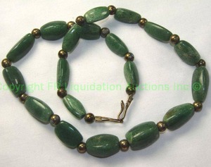 lot 557 image: Green Gemstone Bead Necklace. No markings. Metal beads have condition issues. Possibly Chrysocolla or Chrysoprase 20L