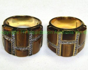 lot 565 image: Sterling Silver and Tiger Eye Band matching Rings Marked 925 SETA Size 8 and size 10 (two)