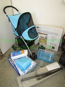 lot 176 image: Assorted pet supplies including pet stroller, gate and more as shown