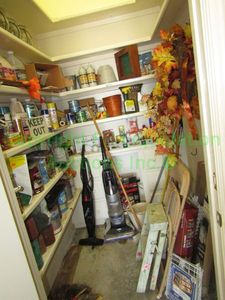 lot 173 image: Contents of utility closet including vacuums, hardware lightbulbs, booster cables and more as shown