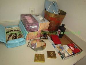 lot 232 image: Assorted personal items including sun glasses, compacts, tissue and more as shown