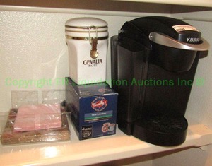 lot 257 image: Keurig single cup coffee maker and supplies