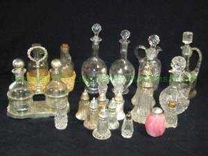 lot 254 image: Antique and vintage cruets, etched oil vinegar bottles, salt and pepper shakers as shown