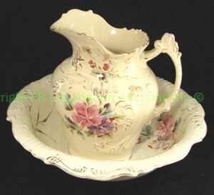 lot 253 image: Antique wash basin and pitcher set Marked CWS 51 Hand painted