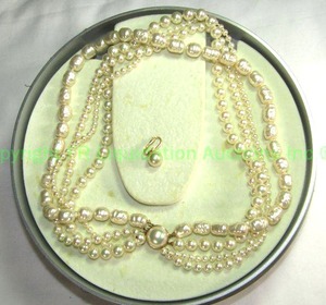 lot 612 image: Majorca Sterling multi strand pearl set in original fitted box. Sterling Clasp. Marked 925