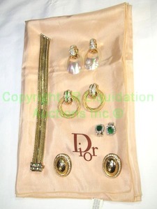 lot 614 image: Christian Dior Clip Earrings (4 sets) and Christian Dior Silk Scarf. Also includes a Christian Dior signed vintage Bracelet