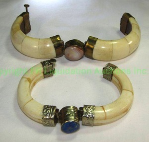 lot 619 image: Set of 2 Carved India Cow bone and gemstone bangle bracelets One has Sodalite, the other Rose Crystal.