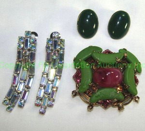 lot 662 image: Signed Schreiner New York Hard To Find Aurora Borealis Dangle Clip Earrings (Marked Schreiner) with Prong set crystals.  Also includes a signed Schreiner New York Brooch and Pair of green clip earrings