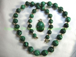 lot 673 image: Polished Malachite graduated bean necklace 22L shepherds crook clasp Also includes a gold filled 12K malachite pendant