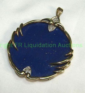 lot 683 image: Yellow Gold (unmarked) Slab cut Blue Lapis and diamond pendant. Diamonds tested About 2W
