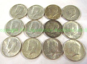 lot 497 image: Silver 1964 Kennedy half dollars (Bid is times the quantity of 12)