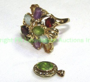 lot 409 image: 14K multi gem flower form ring (marked 14K 585, Approx size 7) and 10K diamond & Peridot pendant Marked 10K WRE