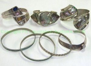 lot 787 image: Sterling silver multi gem hinged bracelet, Taxco sterling and sterling cuffs and bangle bracelets. Alpaca bracelet is not sterling