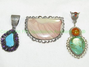 lot 802 image: Sterling pendants. Signed D. Troutman 1998 Silver Creations turquoise & amber, lace agate and turquoise, all marked